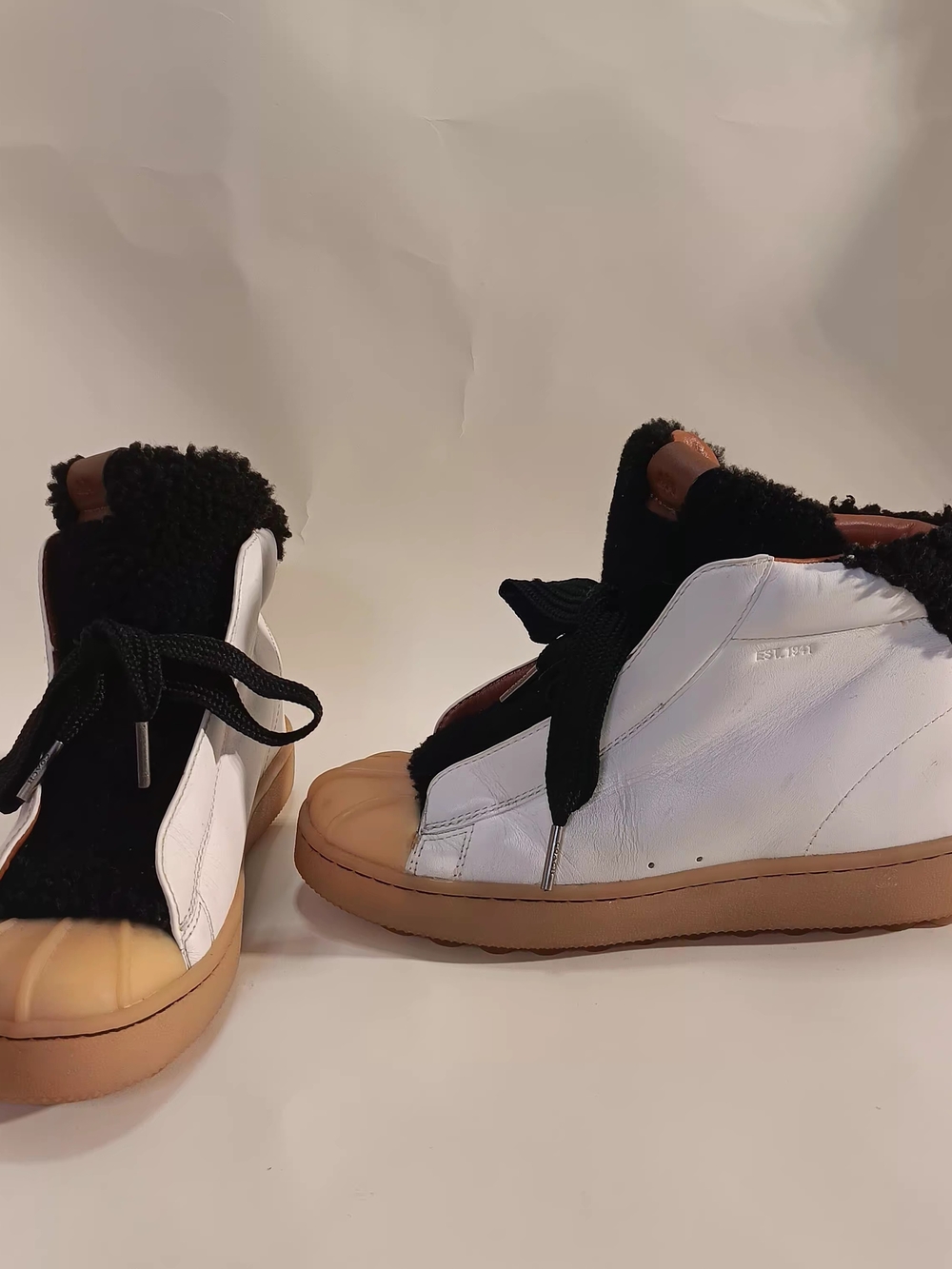 Coach Women’s White and Black Wedge Hiker.
